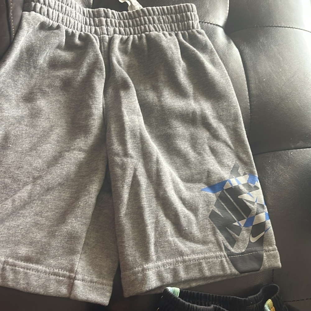 Nike Black Athletic Shorts with Vibrant Stripe